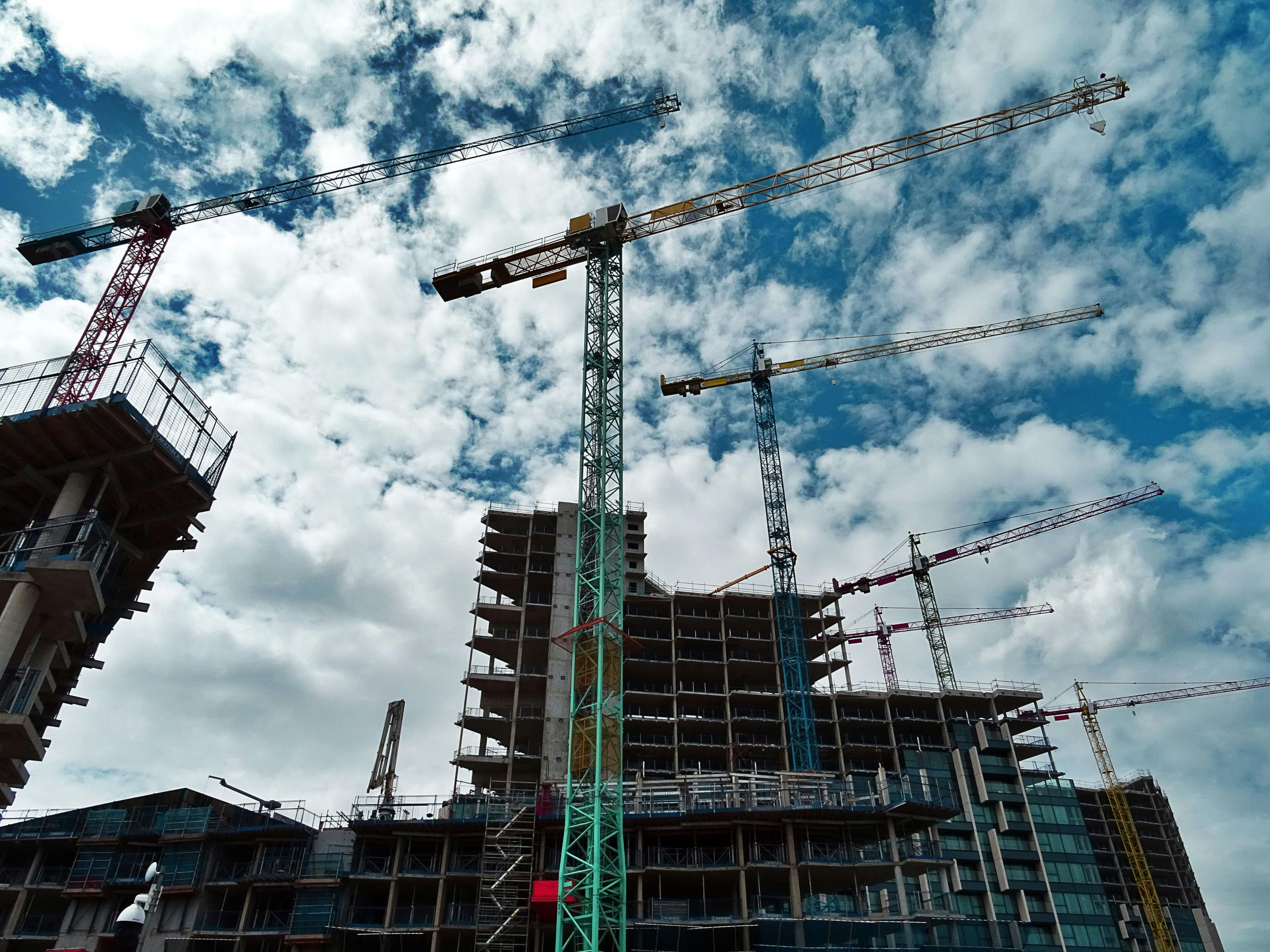 Construction site with cranes and scaffolding